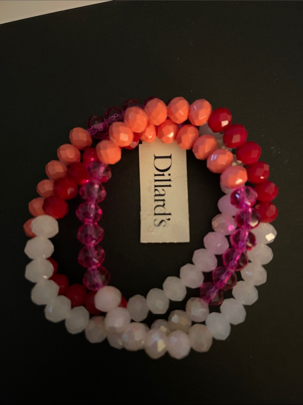 Triple stretch bracelet with faceted stones